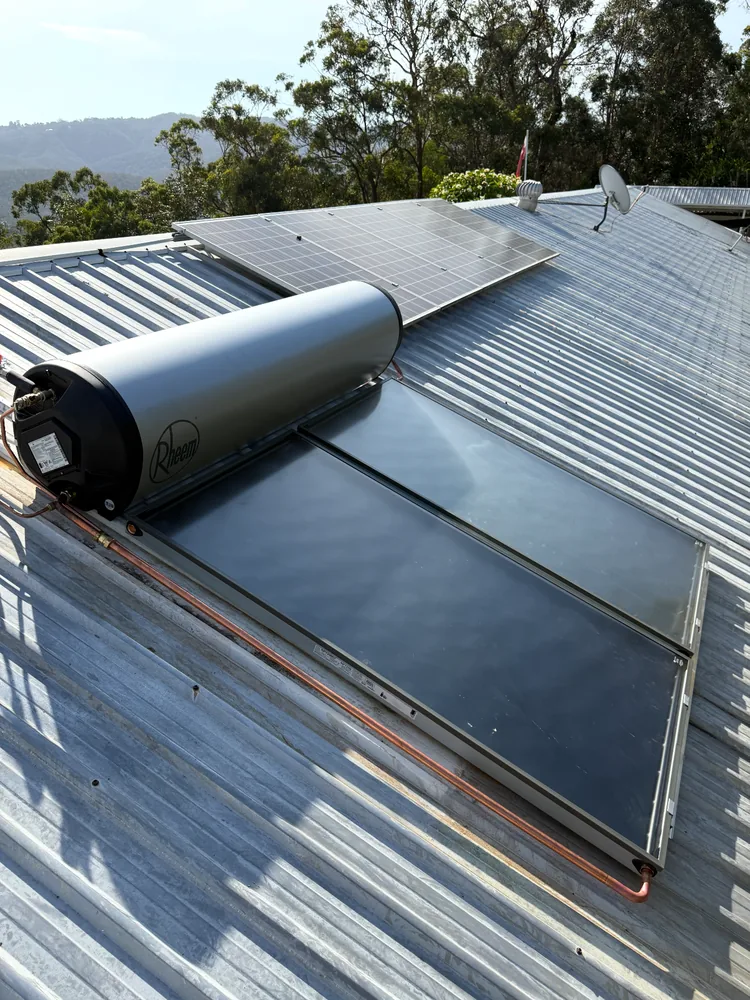 Roof-mounted solar hot water system installed on a Gold Coast home