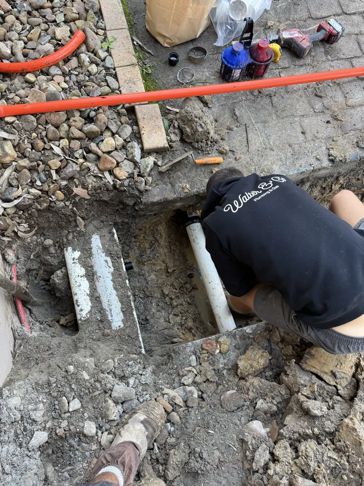 Connecting drainage pipework in rocky ground at Oxenford